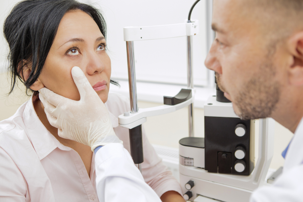 Ophthalmologist performing an exam